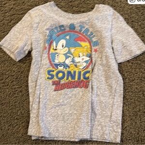 Lot of 4 boys t-shirts. Sizes 6 &  7.